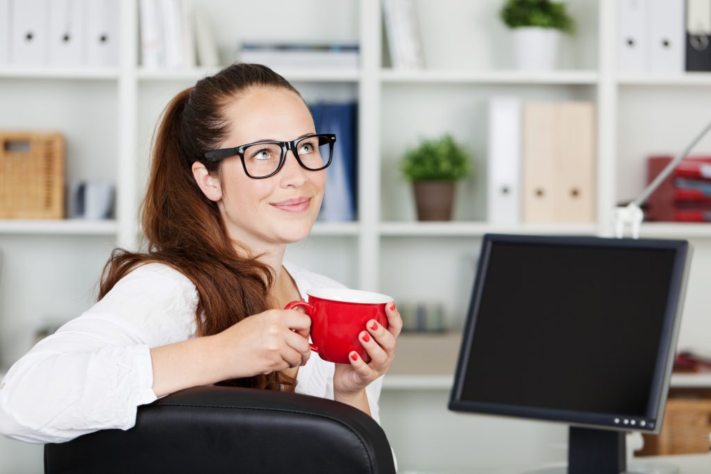 Lady enjoying her cup of coffee