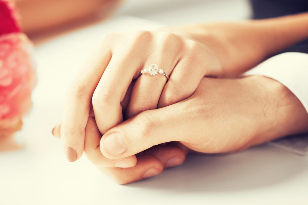 Couple holding hands