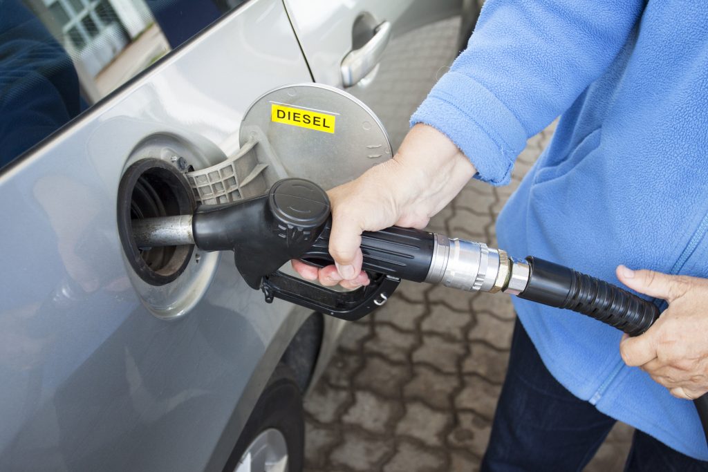 Car Filling Up on Fuel