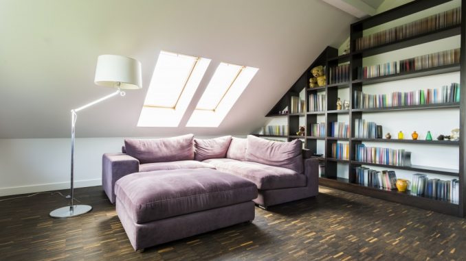 a purple sofa in the attic