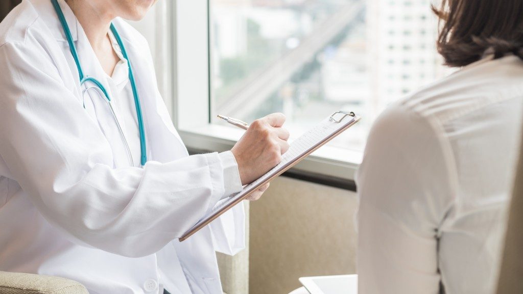 Doctor writing