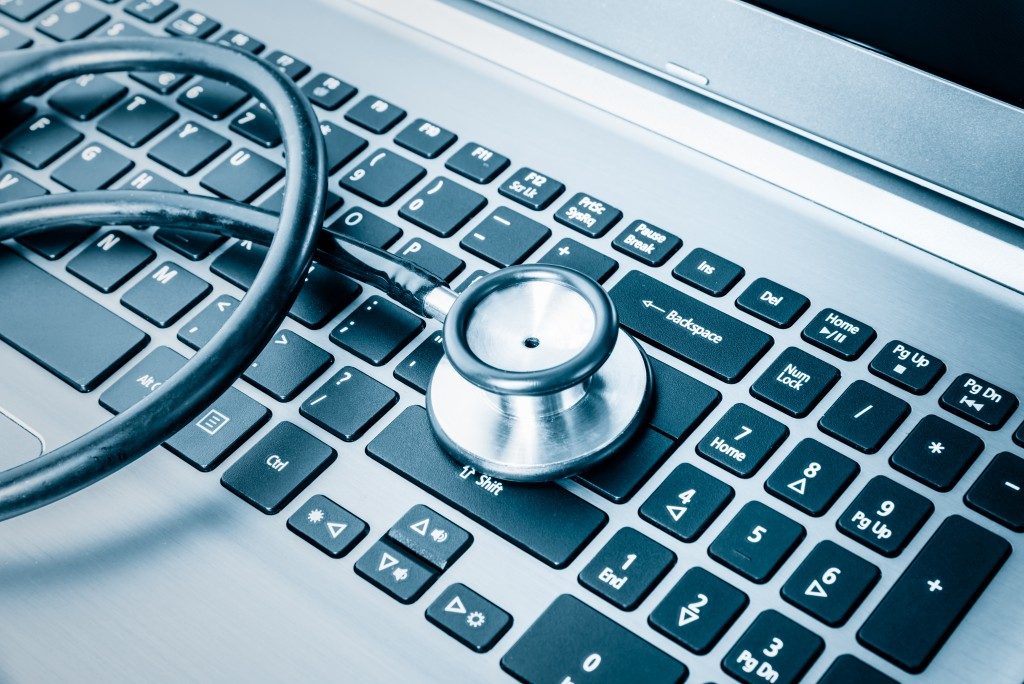 Stethoscope on laptop