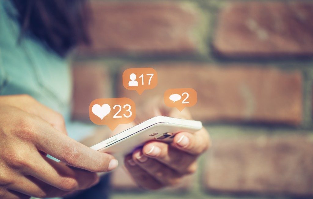 person scrolling in a scocial media app