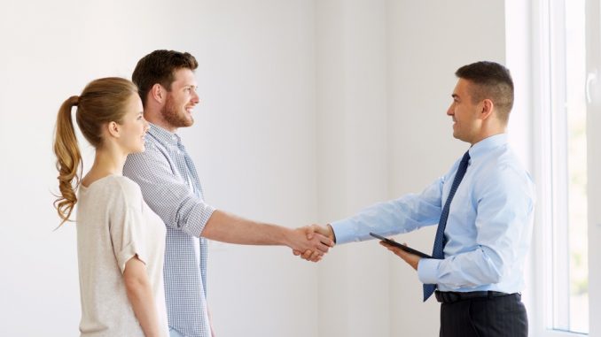 client and employee shaking hands