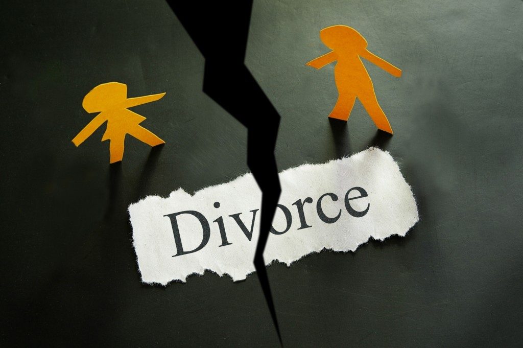 Torn piece of paper with divorce concept