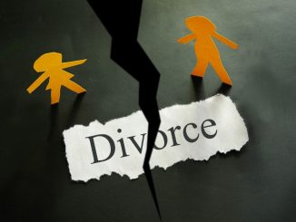 Torn piece of paper with divorce concept