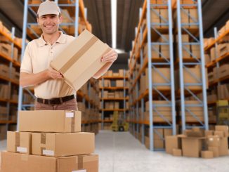 Delivery man carrying a parcel