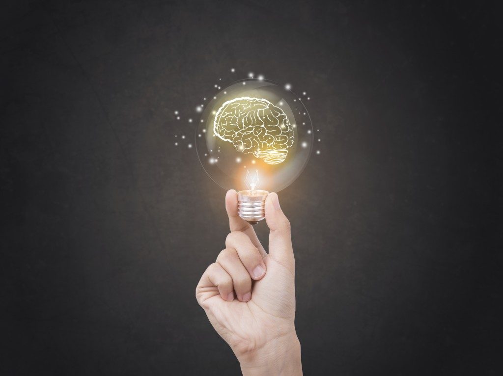 bright idea concept with brain inside a lightbulb