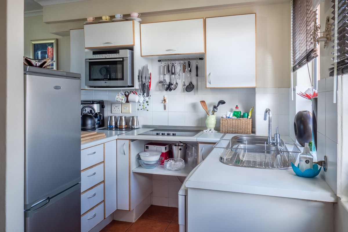 Tall white kitchen pantry cabinet