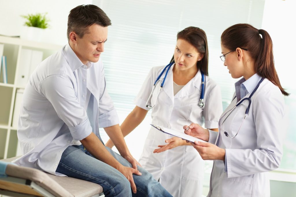 injured man in doctors