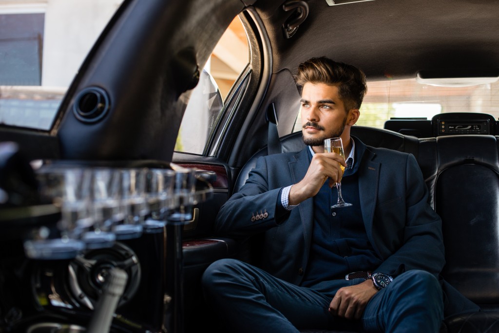 man inside a limo