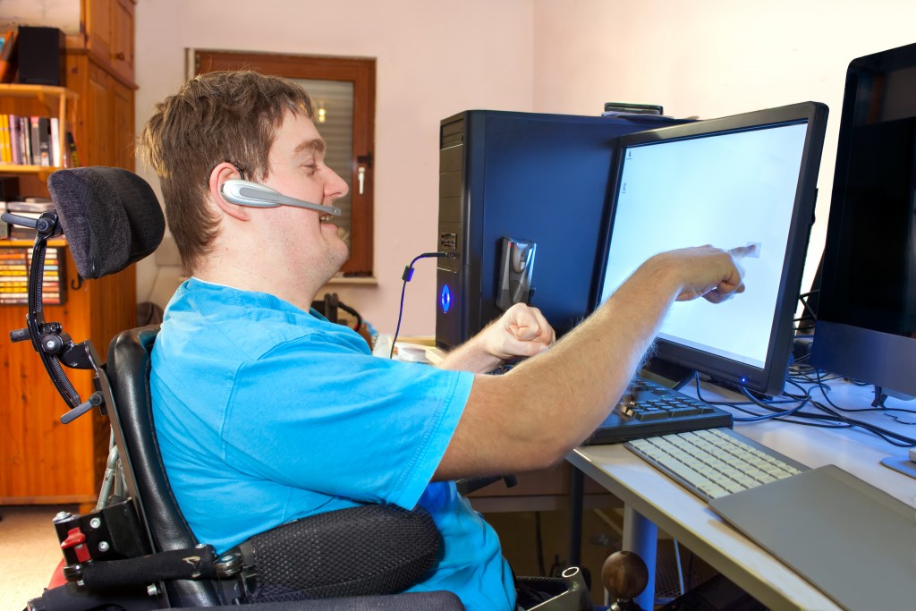 disabled man using the computer