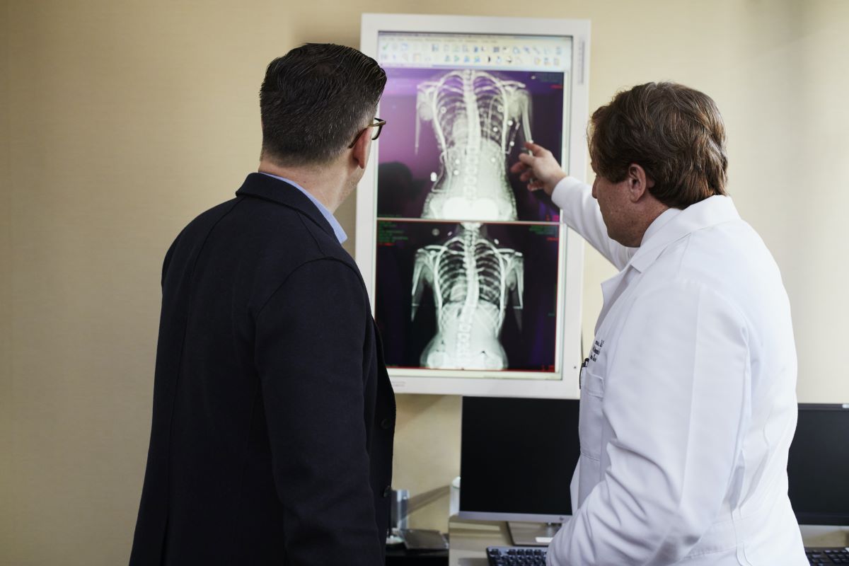 doctor pointing at x-ray