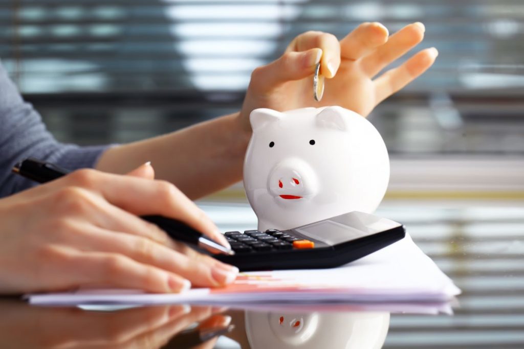 piggy bank and calculator